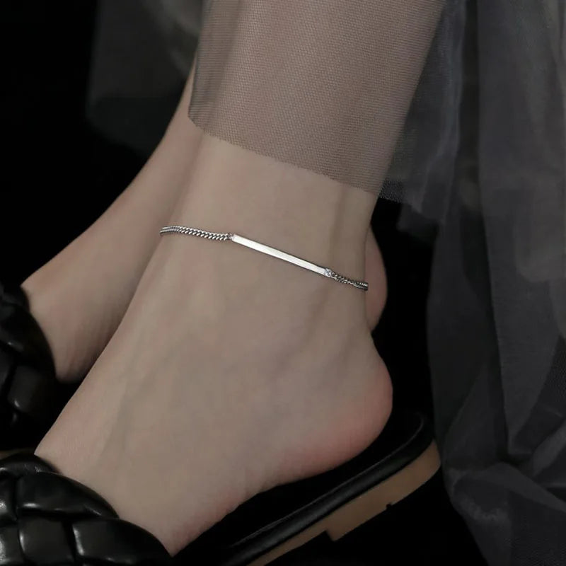 Elegancka srebrna bransoletka na kostkę